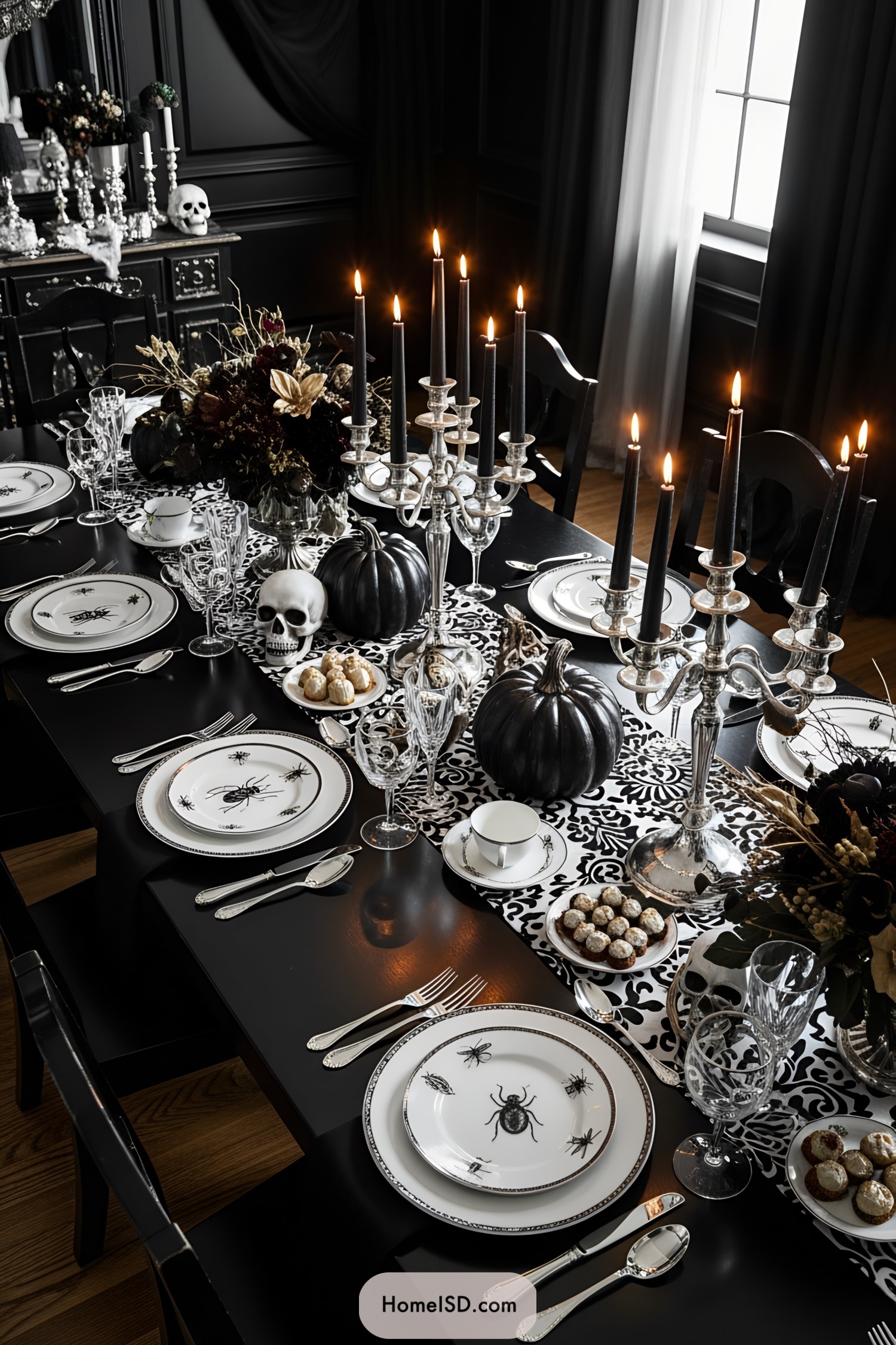 Elegant Halloween dining table with black and white decor and skull accents