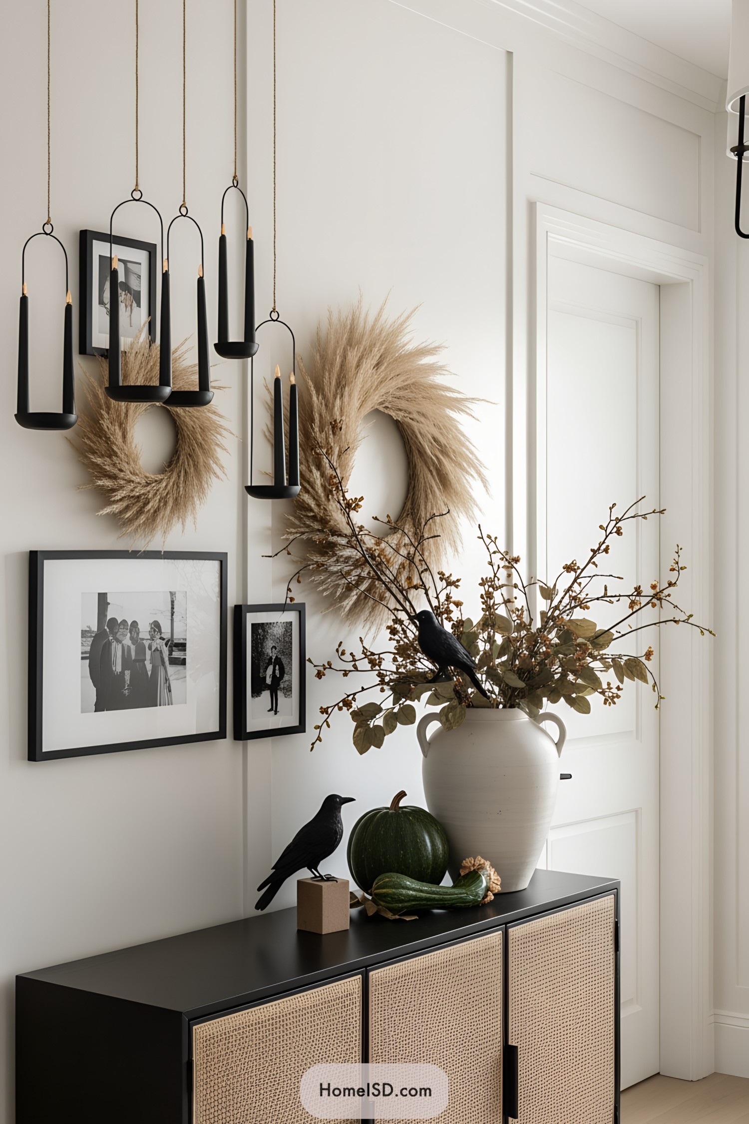 Halloween decor with pampas wreaths and black candlesticks