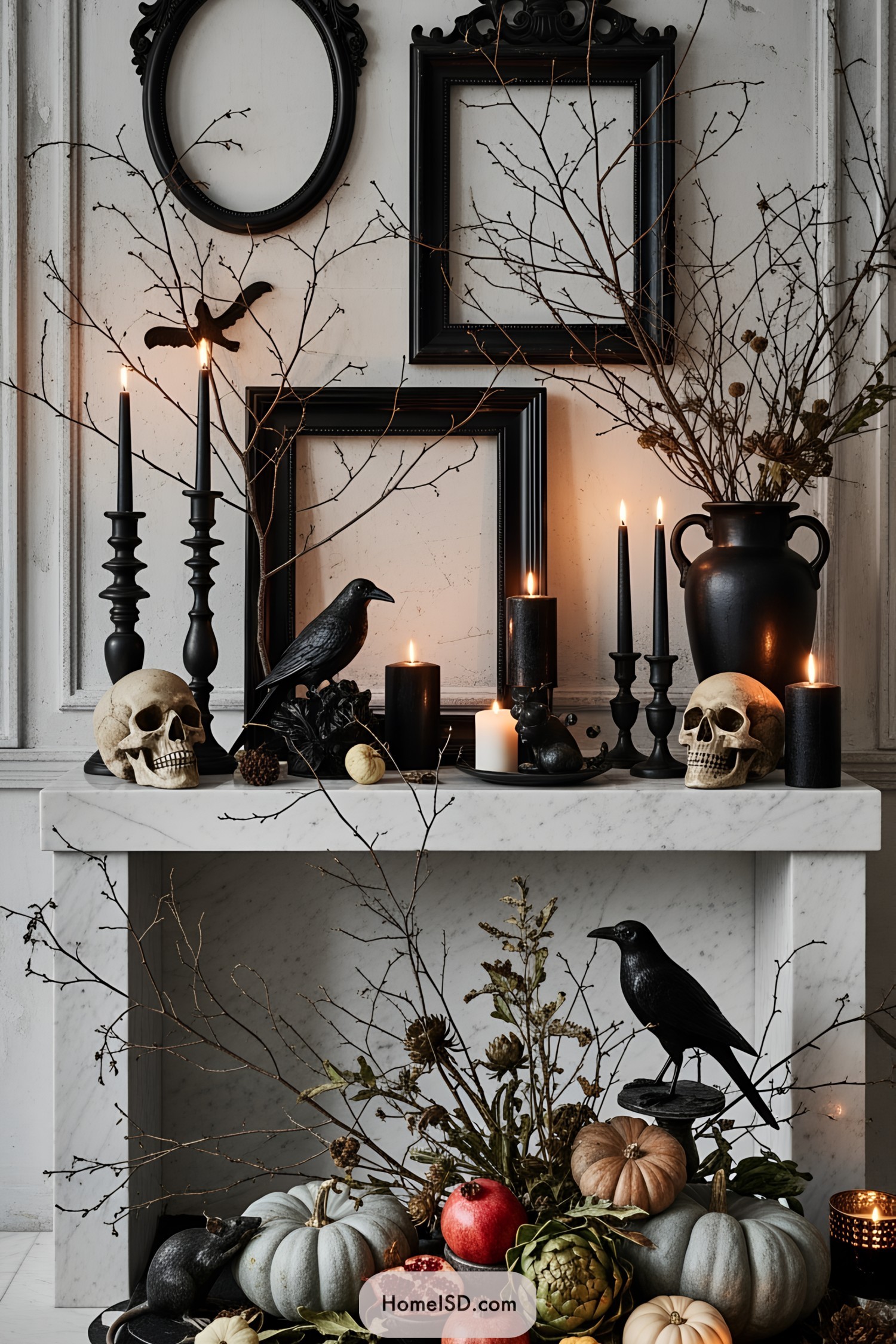 Halloween-themed mantel with skulls, crows, and candles