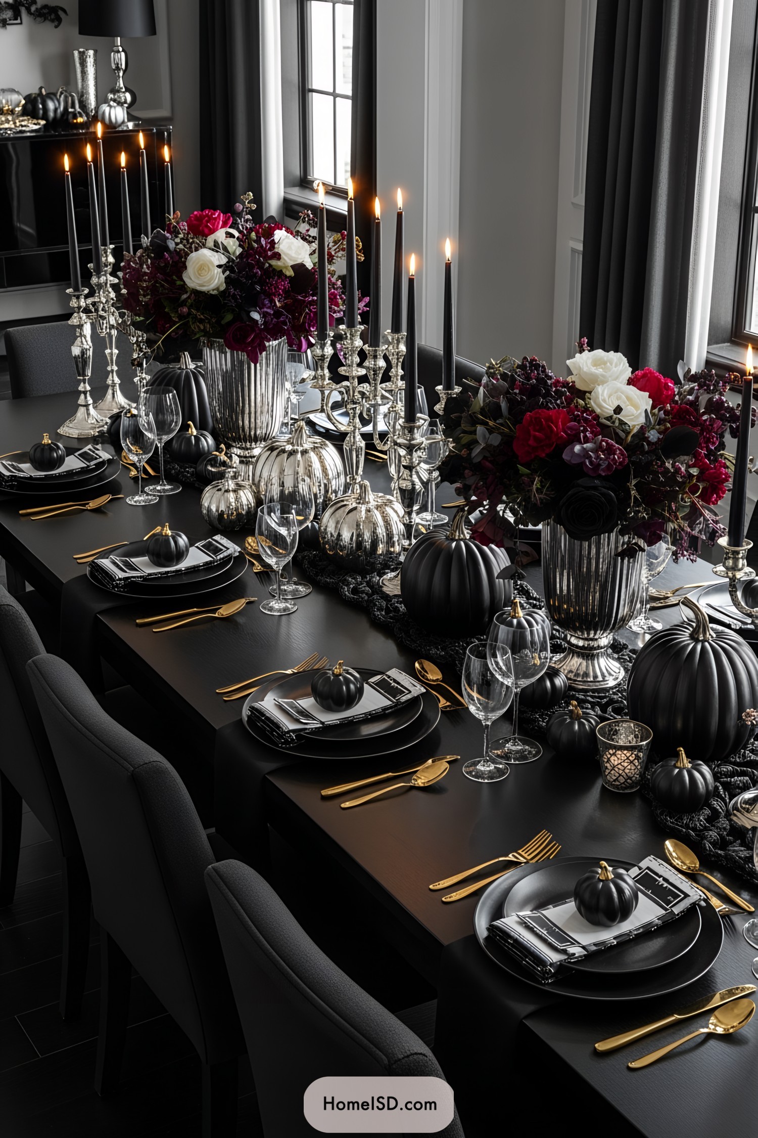 Elegant Halloween dining table with black and silver decor