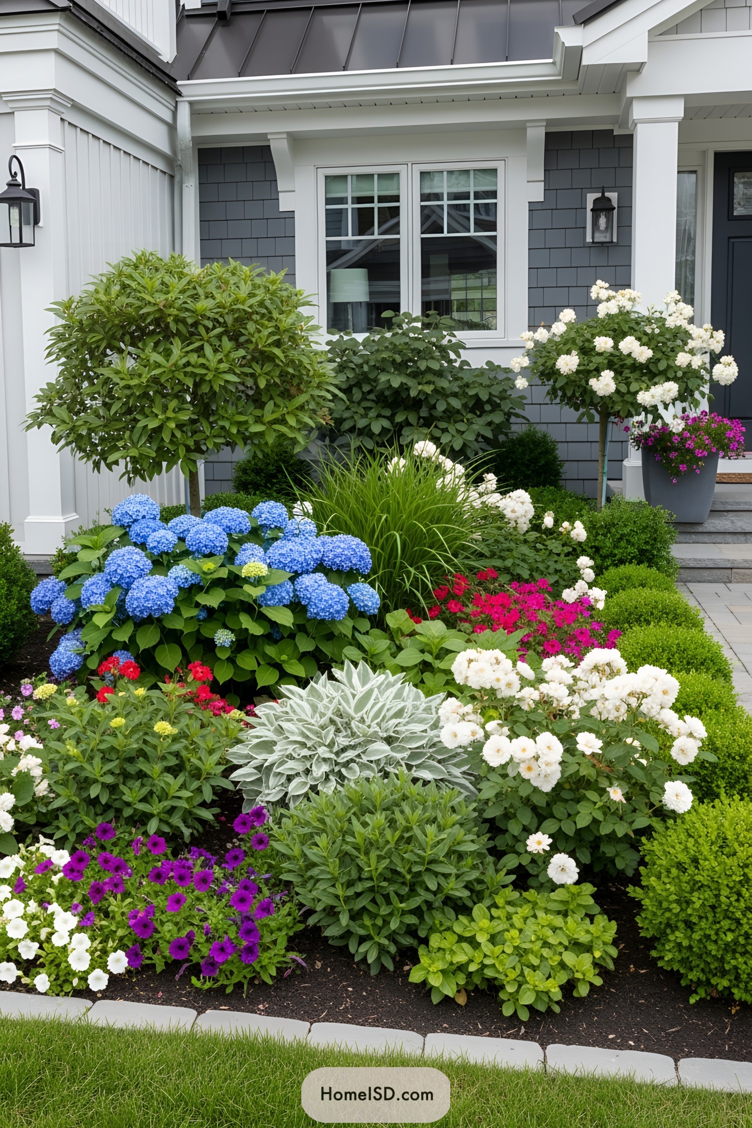 Colorful flowers and greenery in a front garden