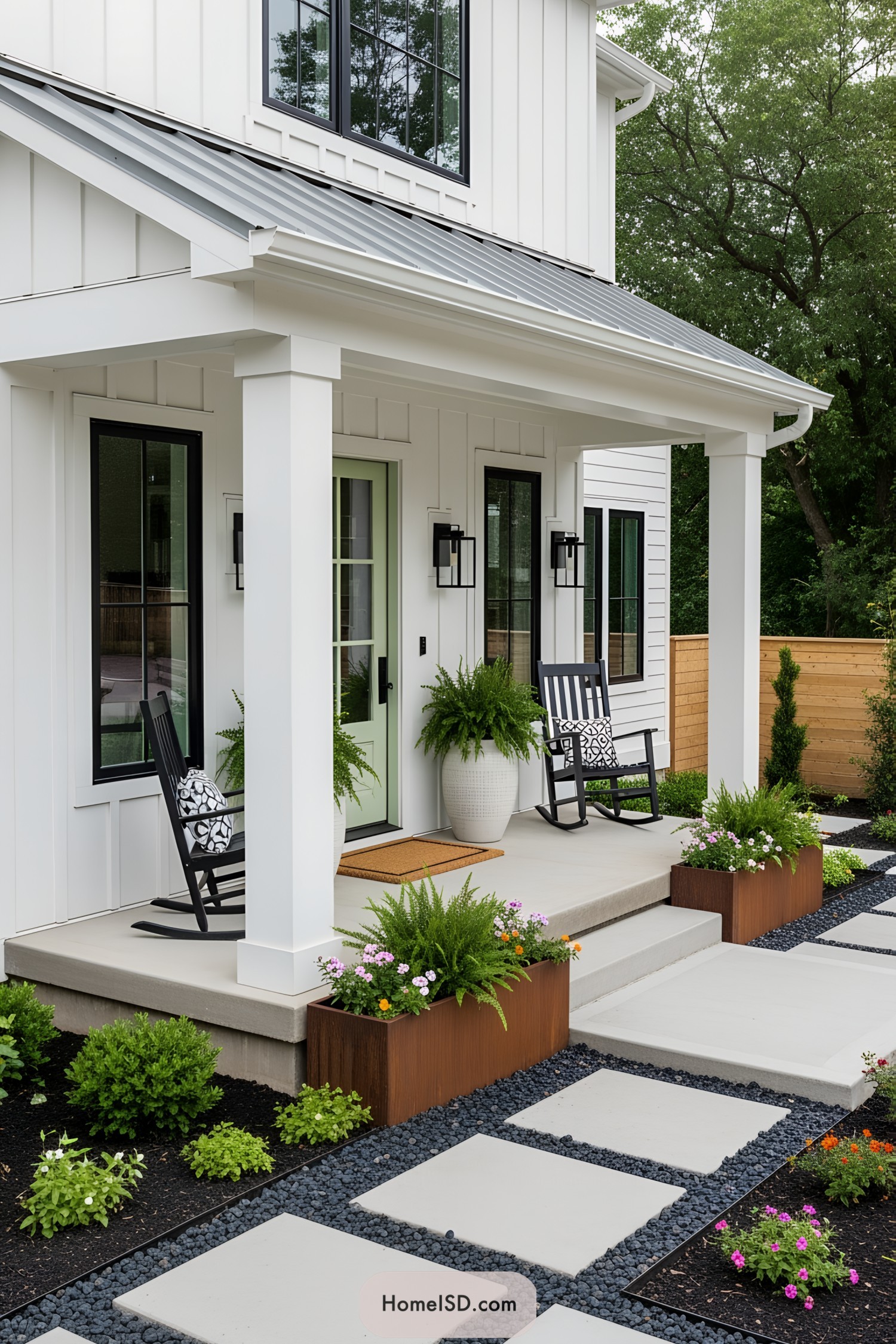 Modern porch with black rocking chairs and plants