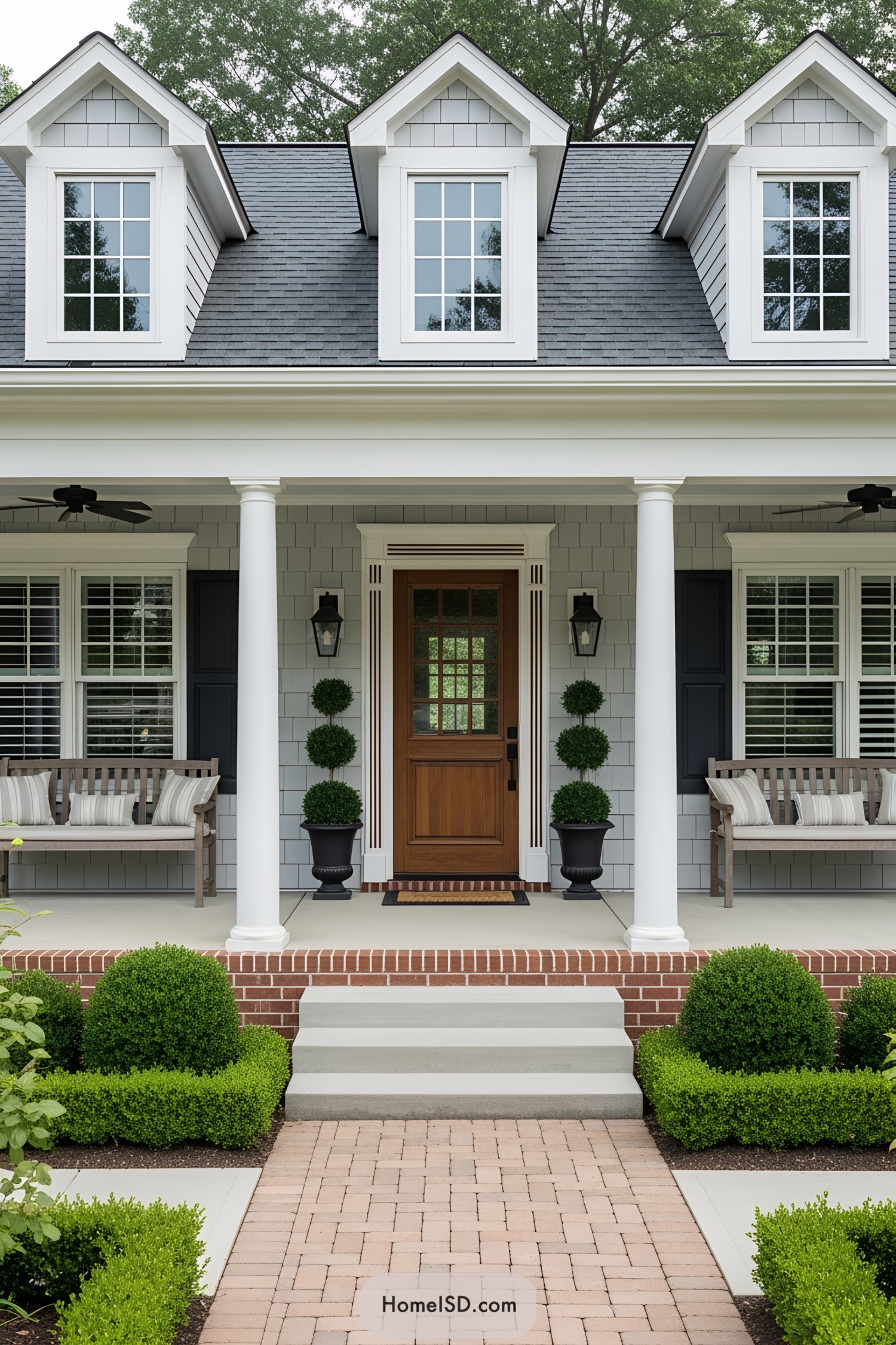 Charming porch with benches and greenery