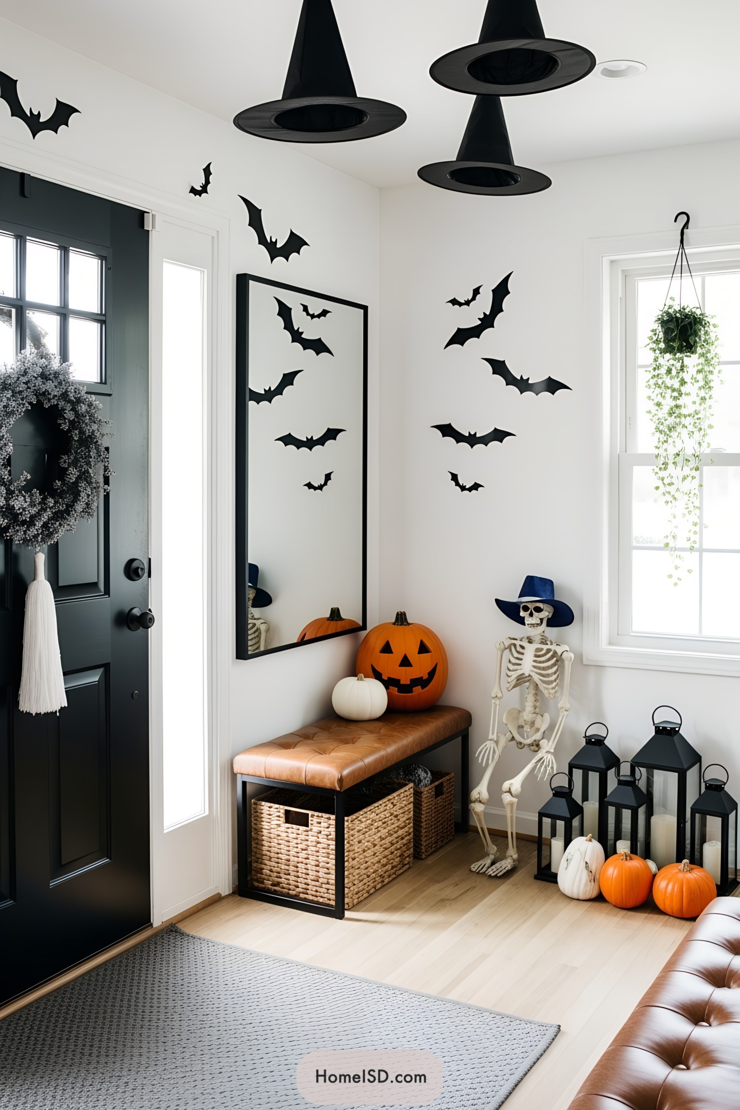 Halloween-themed entryway with bats and pumpkins