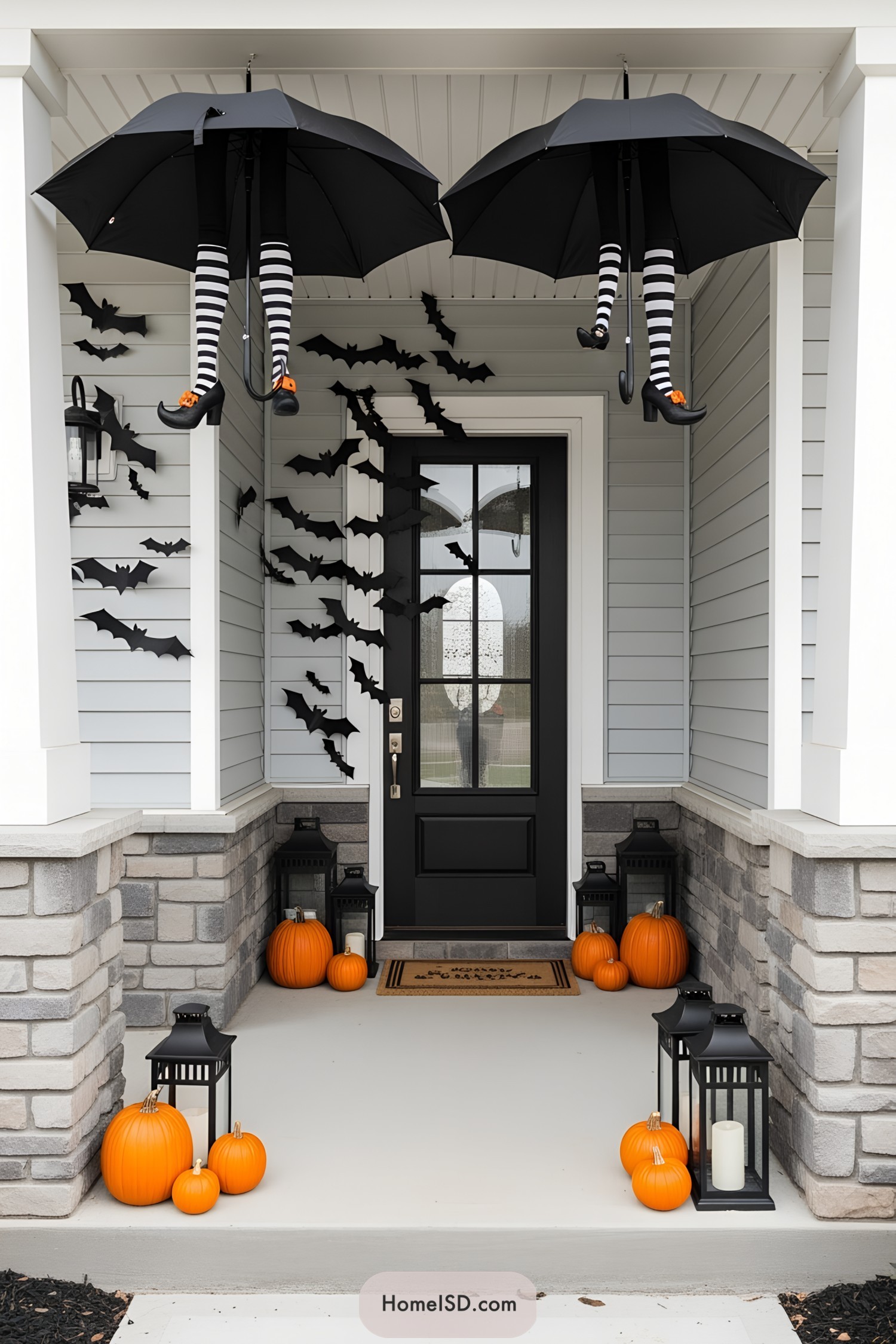 Halloween-themed porch with witch legs and bats