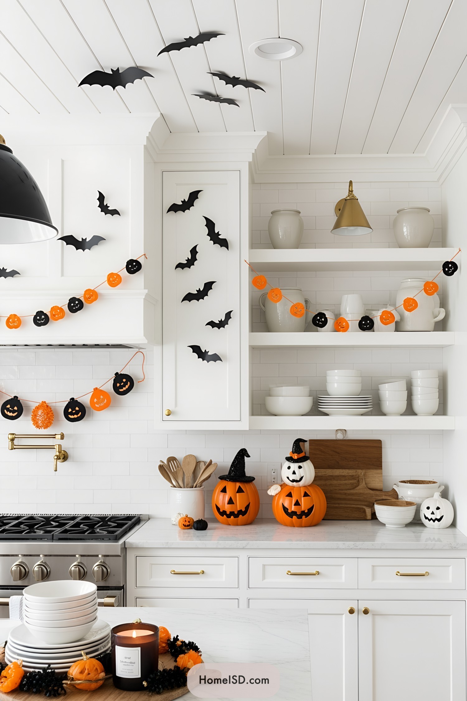 Halloween-themed kitchen with bat and pumpkin decorations
