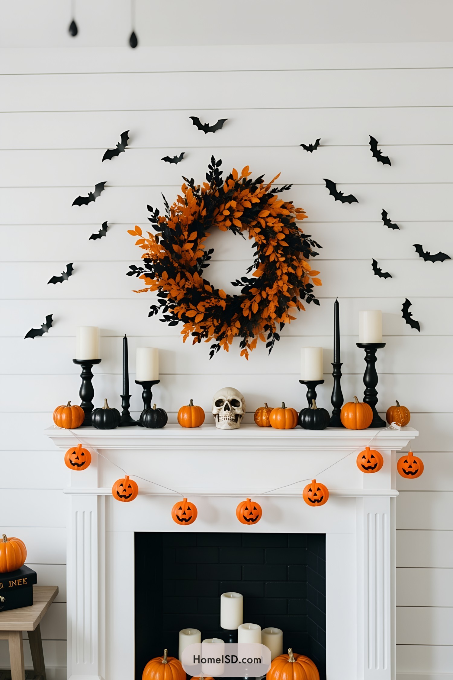 Halloween mantel with wreath and pumpkins