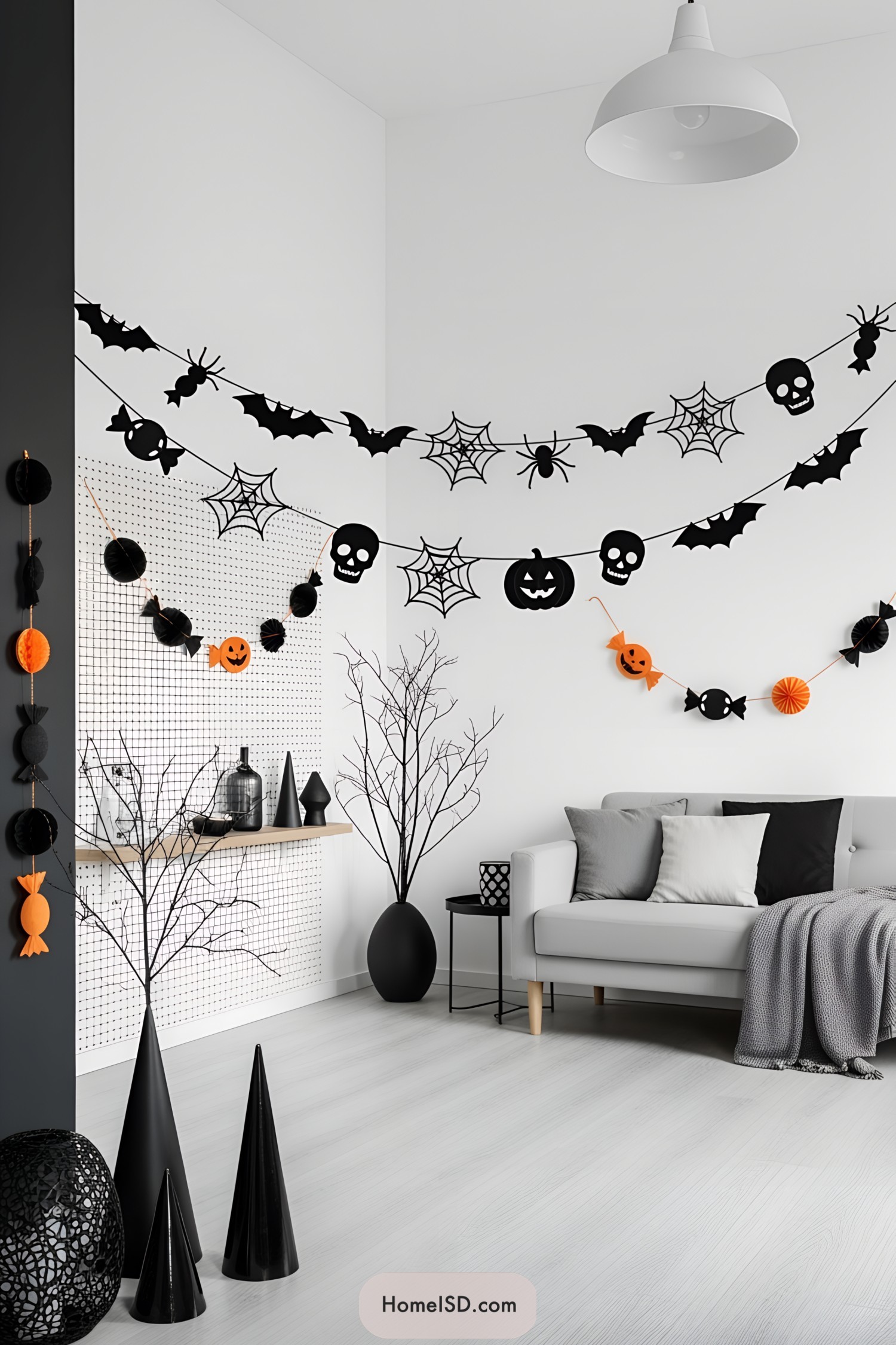 Modern living room with Halloween garlands and minimalist decor