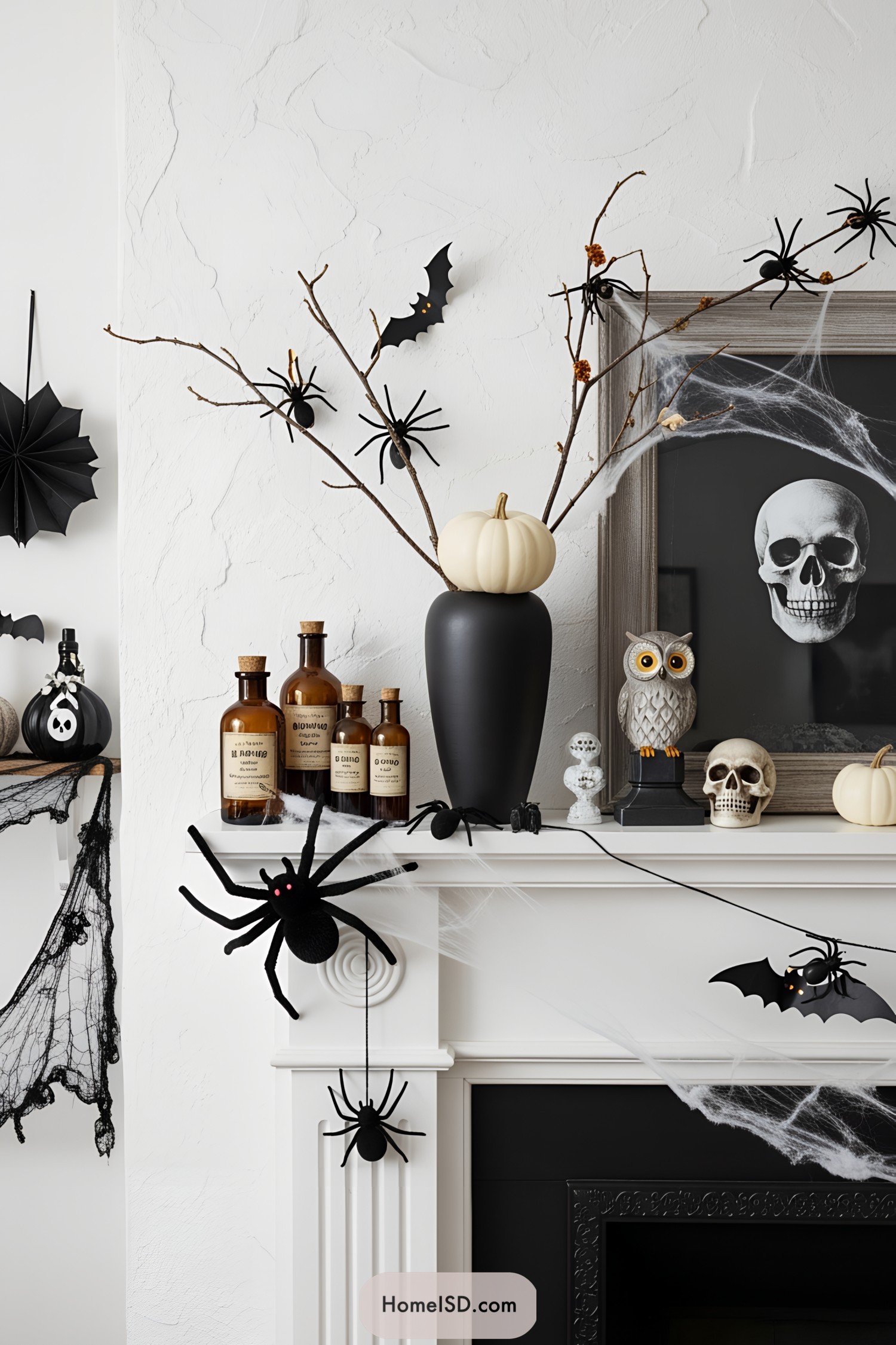 Halloween-themed mantel with spooky decor