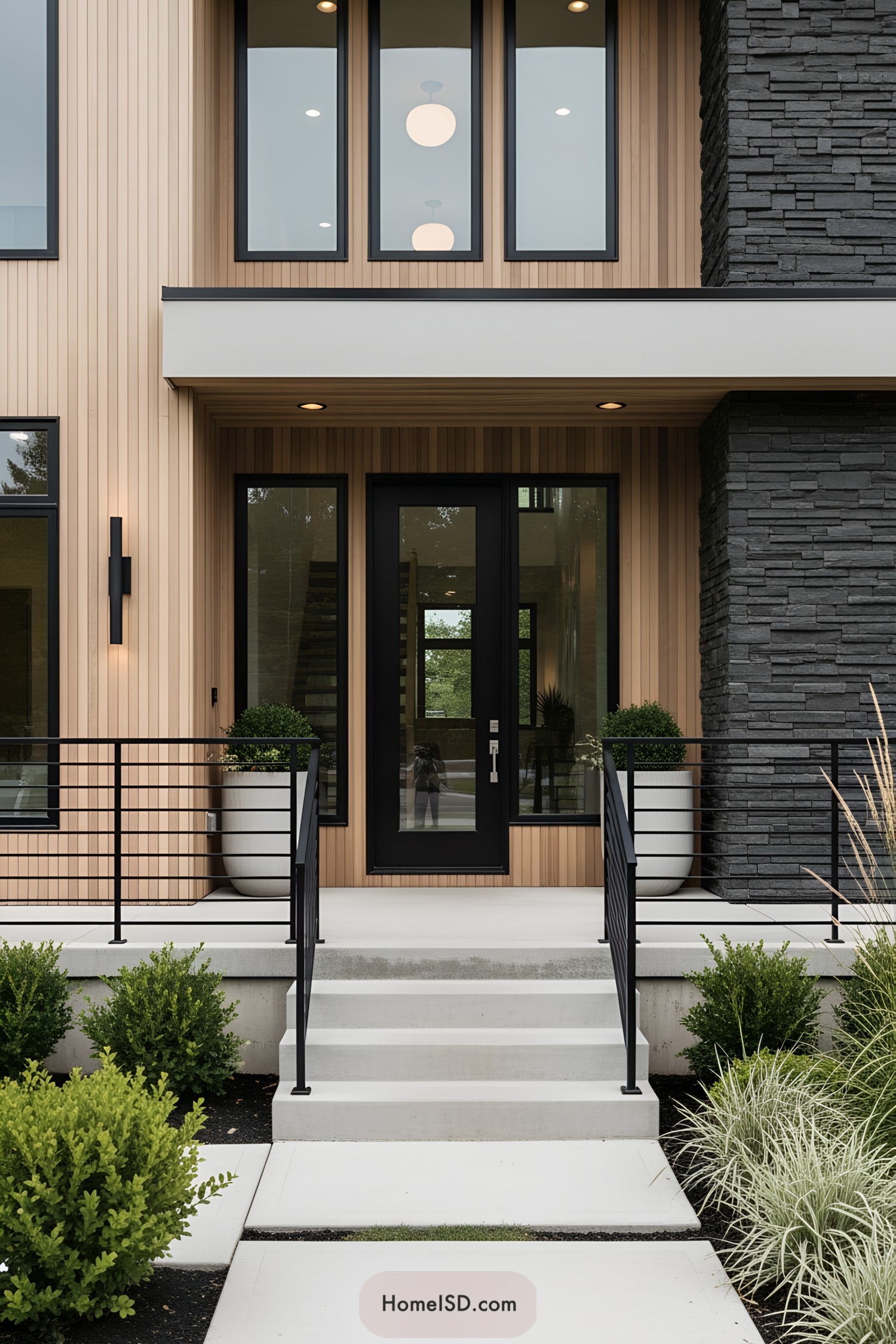Stylish modern entry with clean lines and greenery