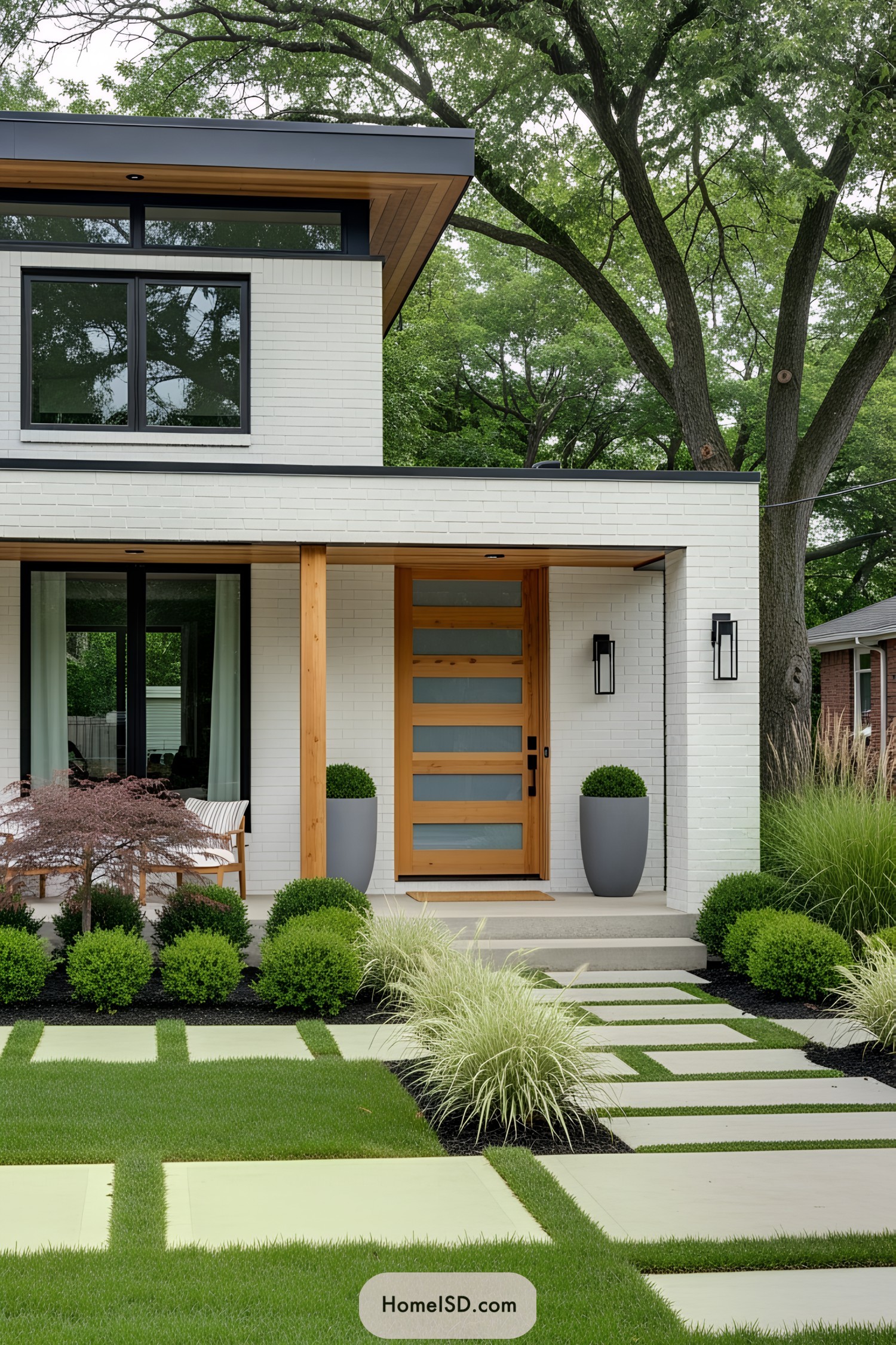 Modern home exterior with clean lines and greenery
