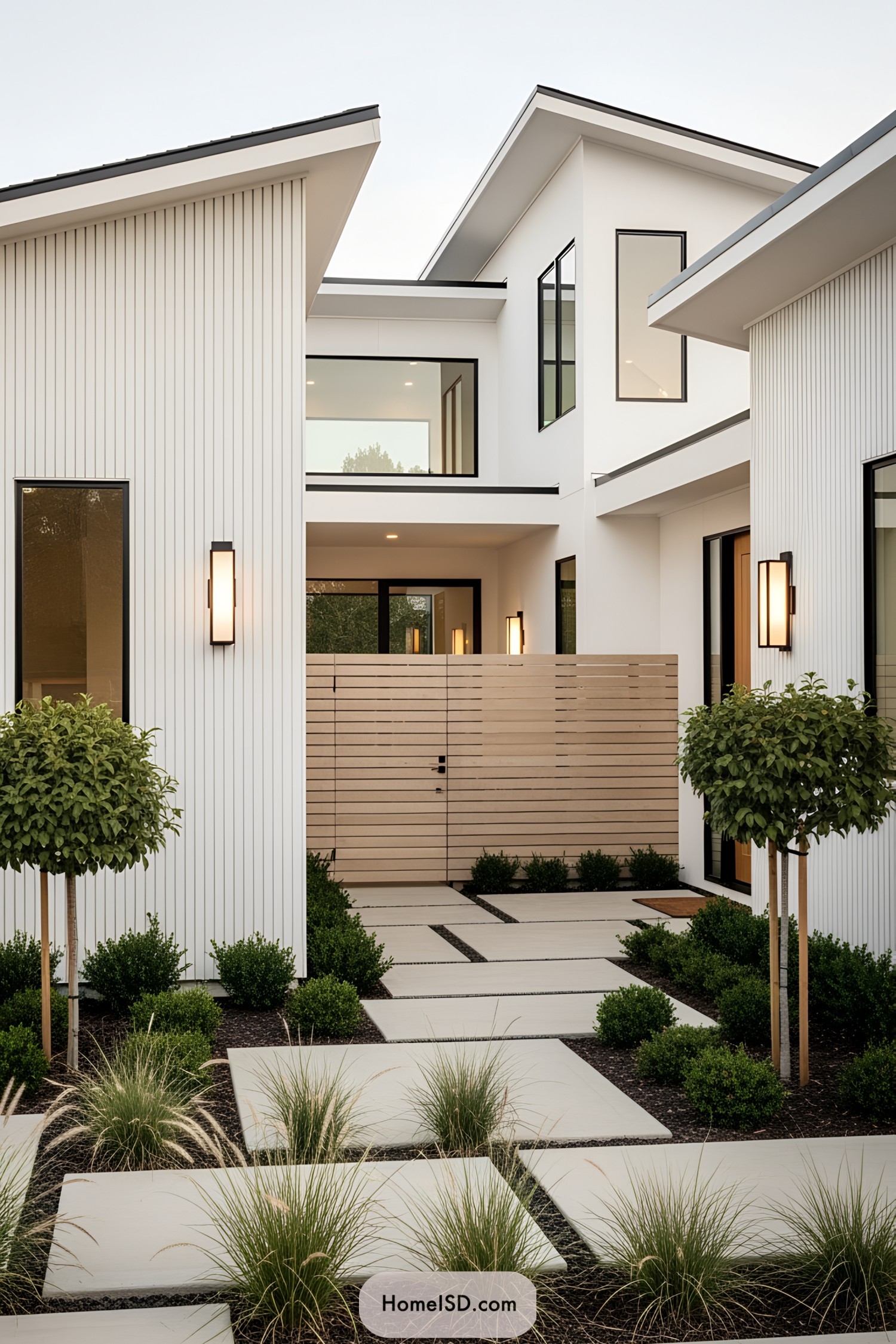 Modern home entrance with geometric design and greenery