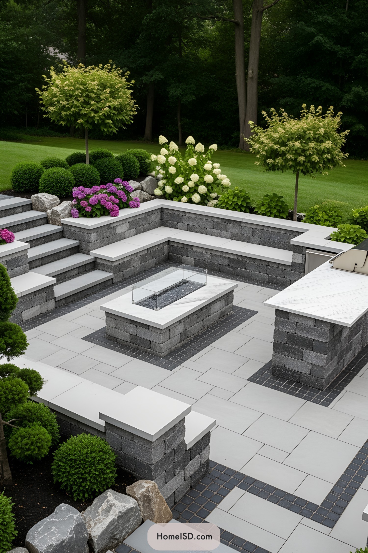 Modern paver patio with seating and lush greenery
