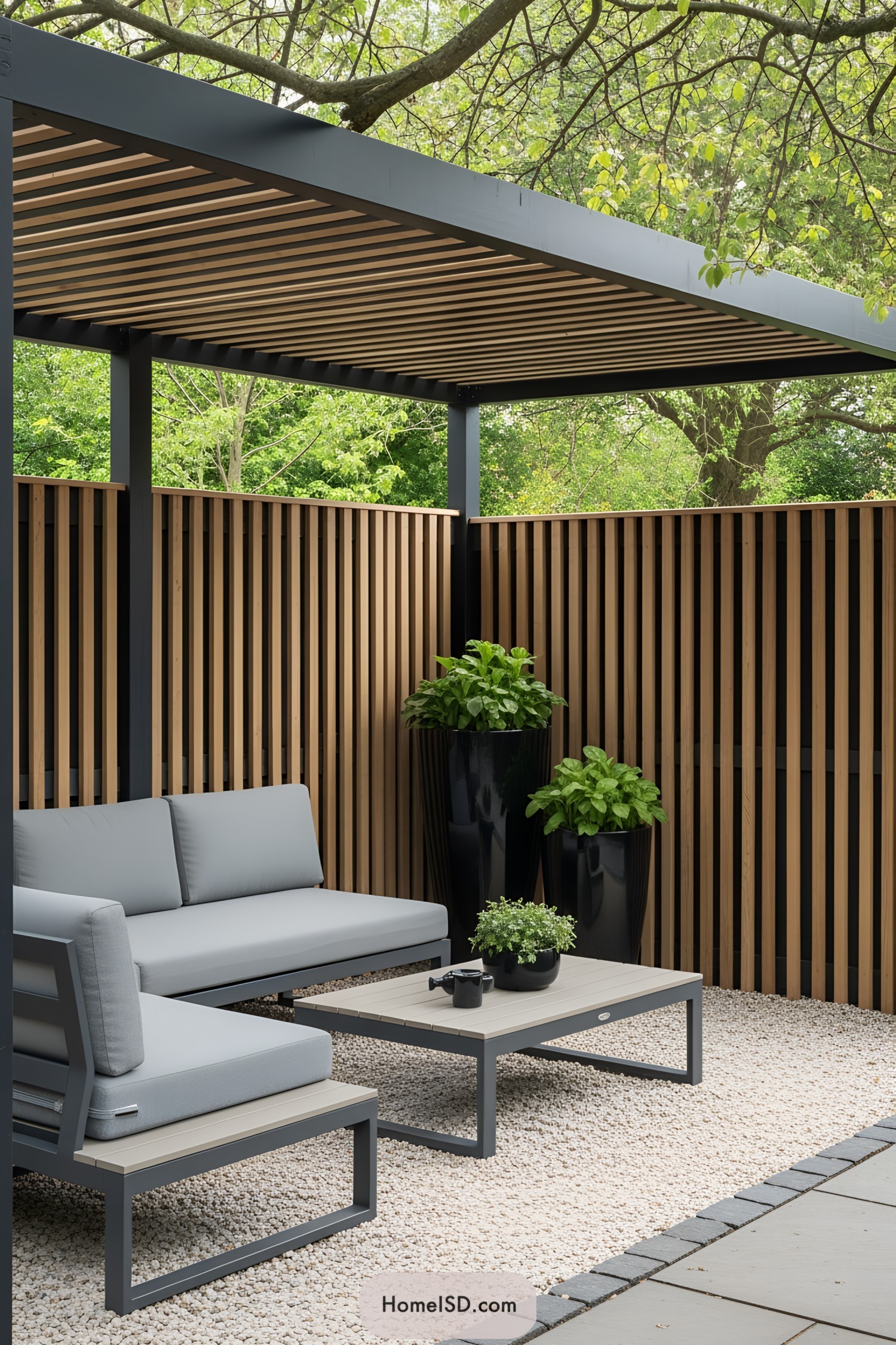 Modern patio with a seating area and wooden privacy screens