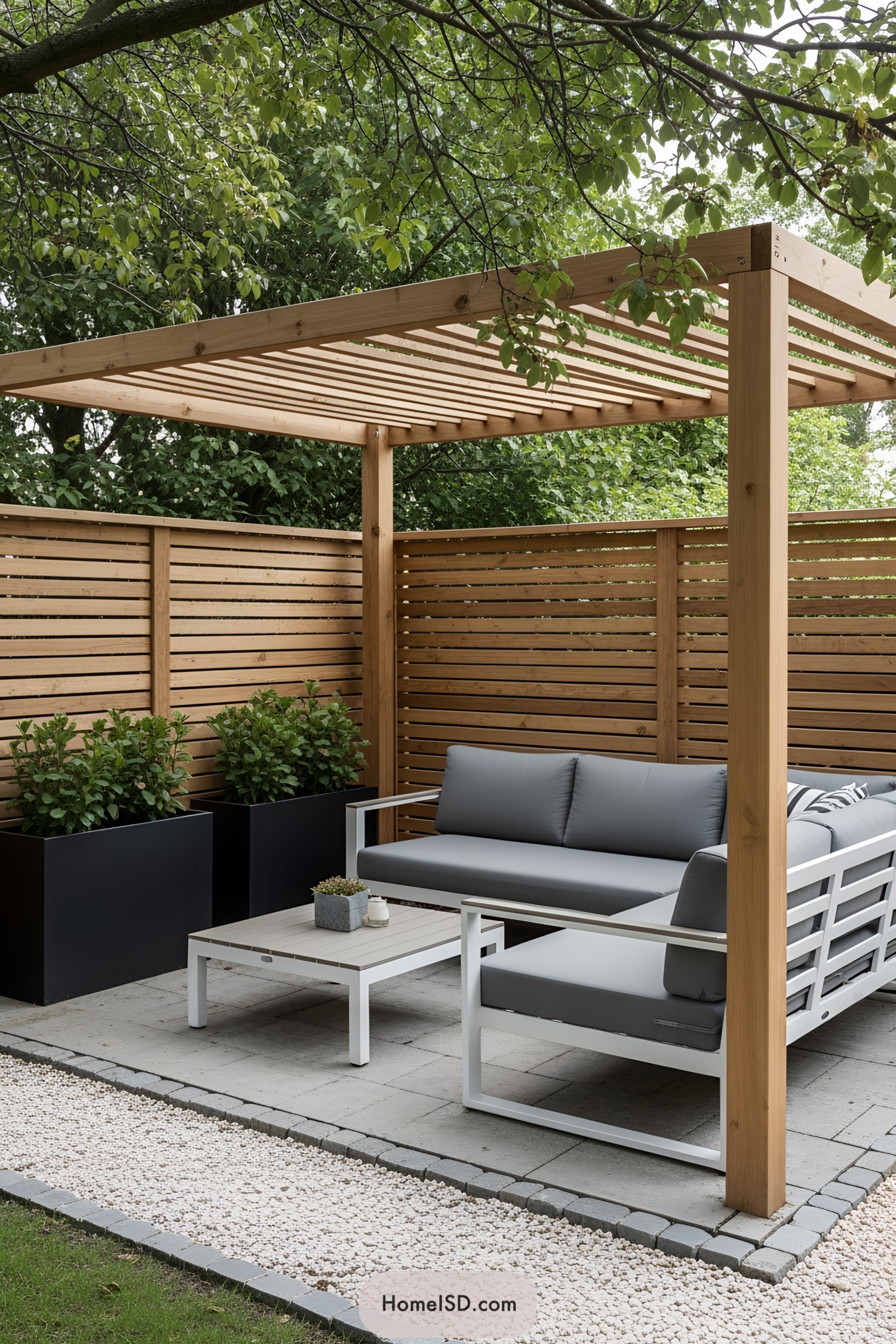 Stylish small patio with wooden pergola