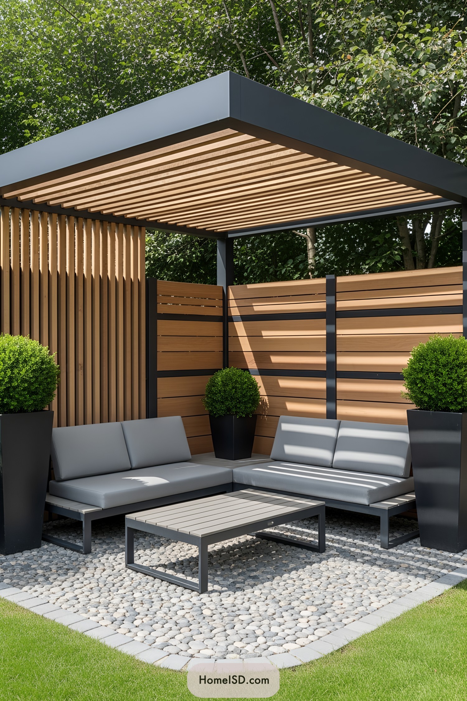 Sleek patio with contemporary seating and greenery