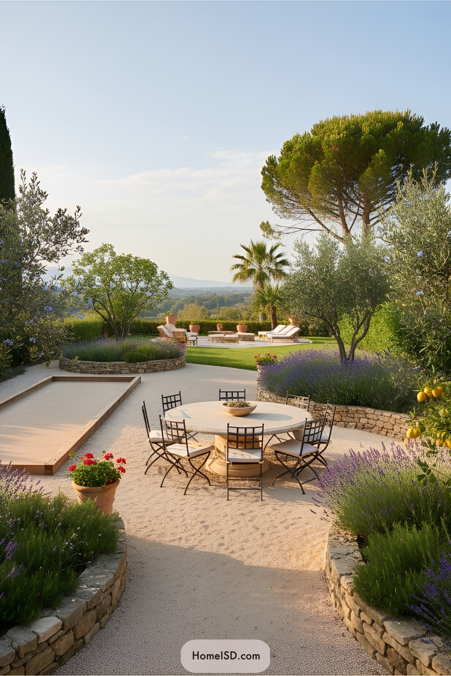 A charming Mediterranean-style garden with seating and lush greenery