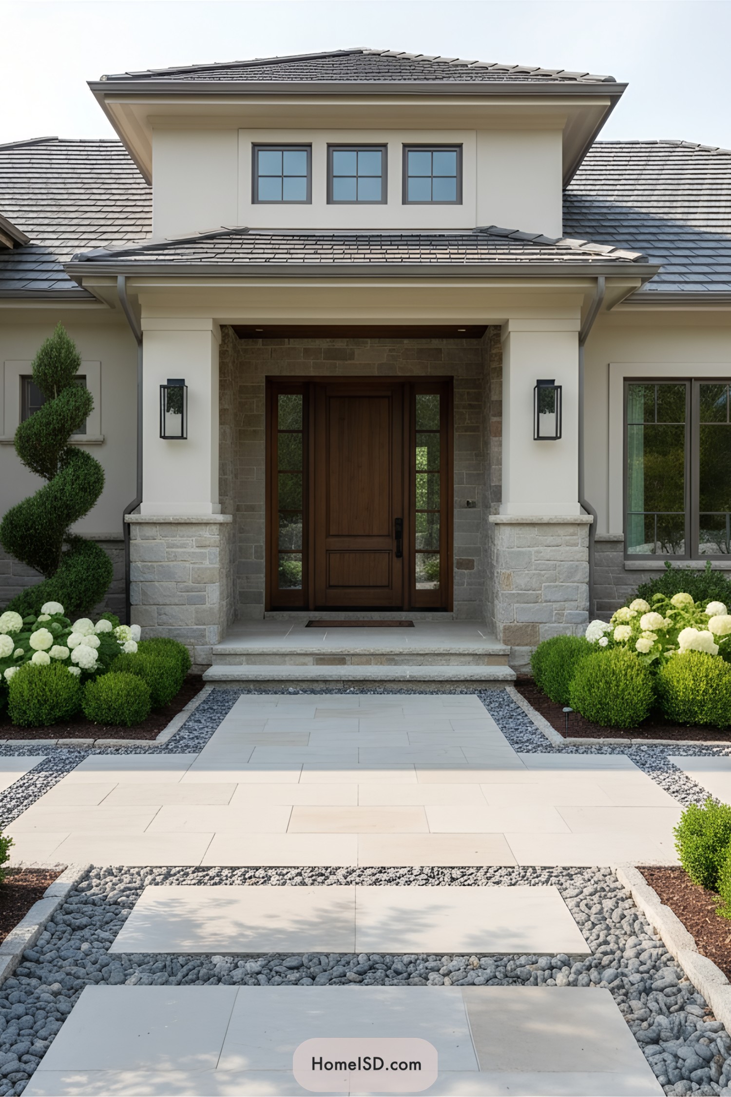Chic entrance with stone pathway and topiary elegance