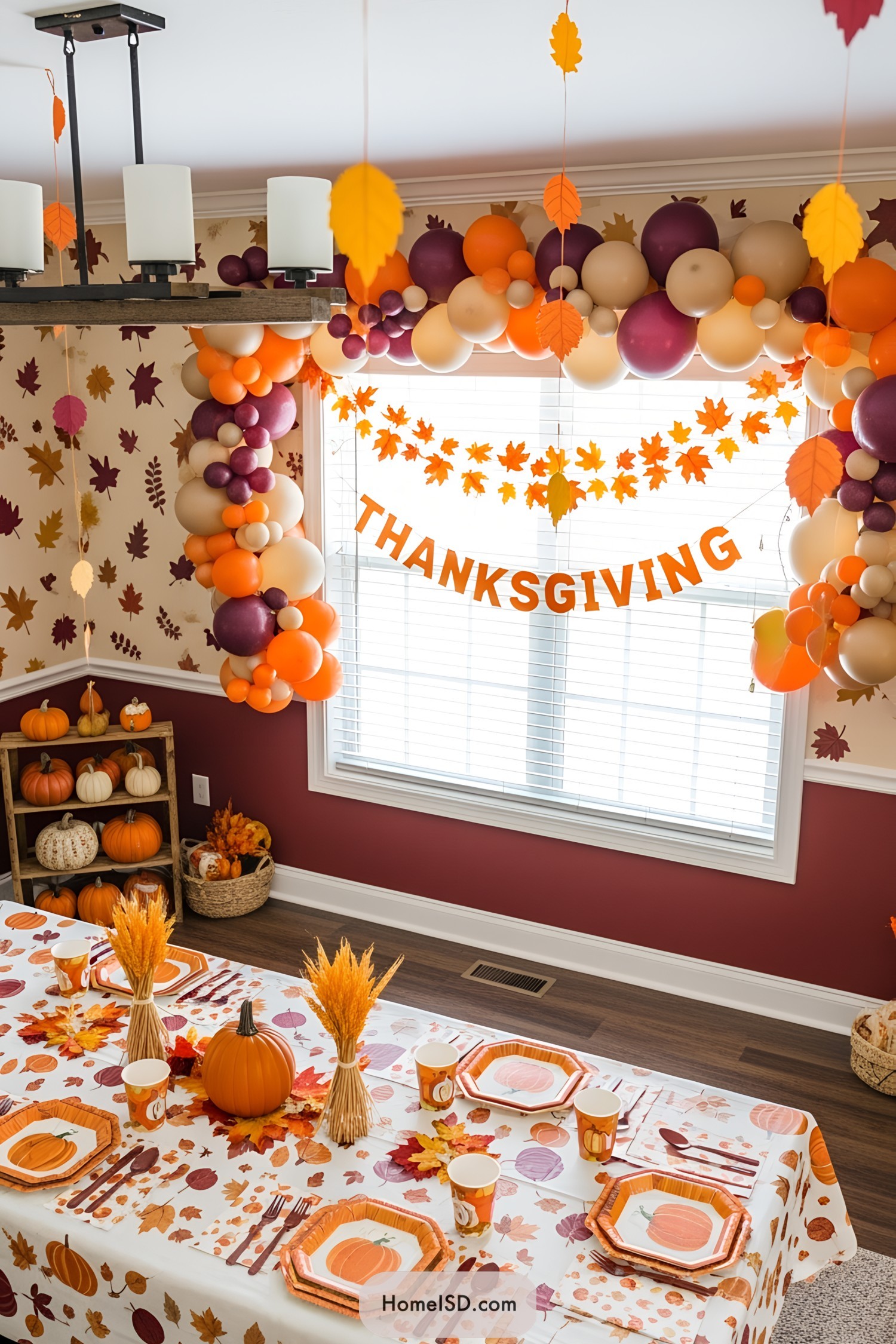 Thanksgiving table with vibrant balloons and autumn decor
