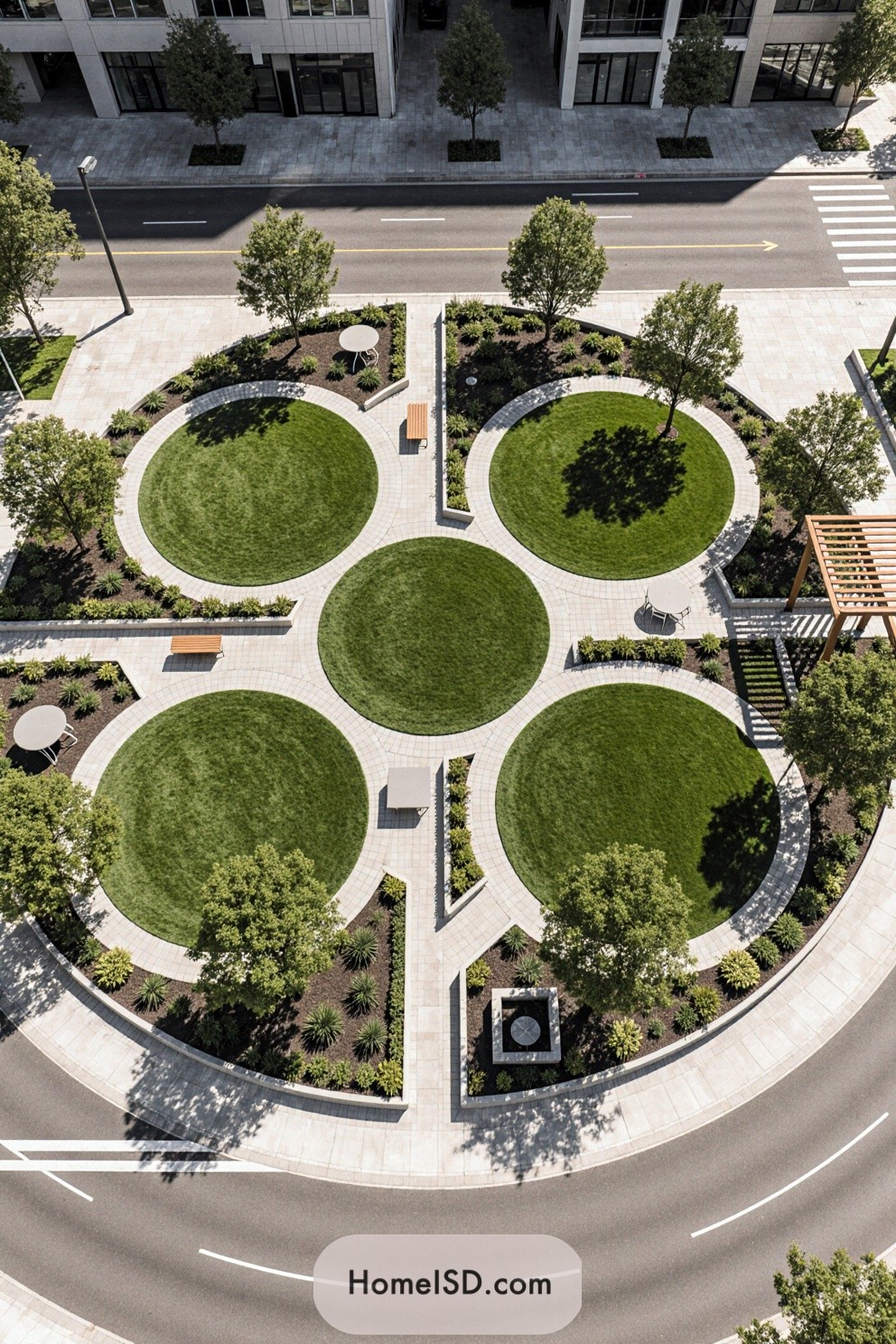 Aerial view of a circular green park design in a city setting