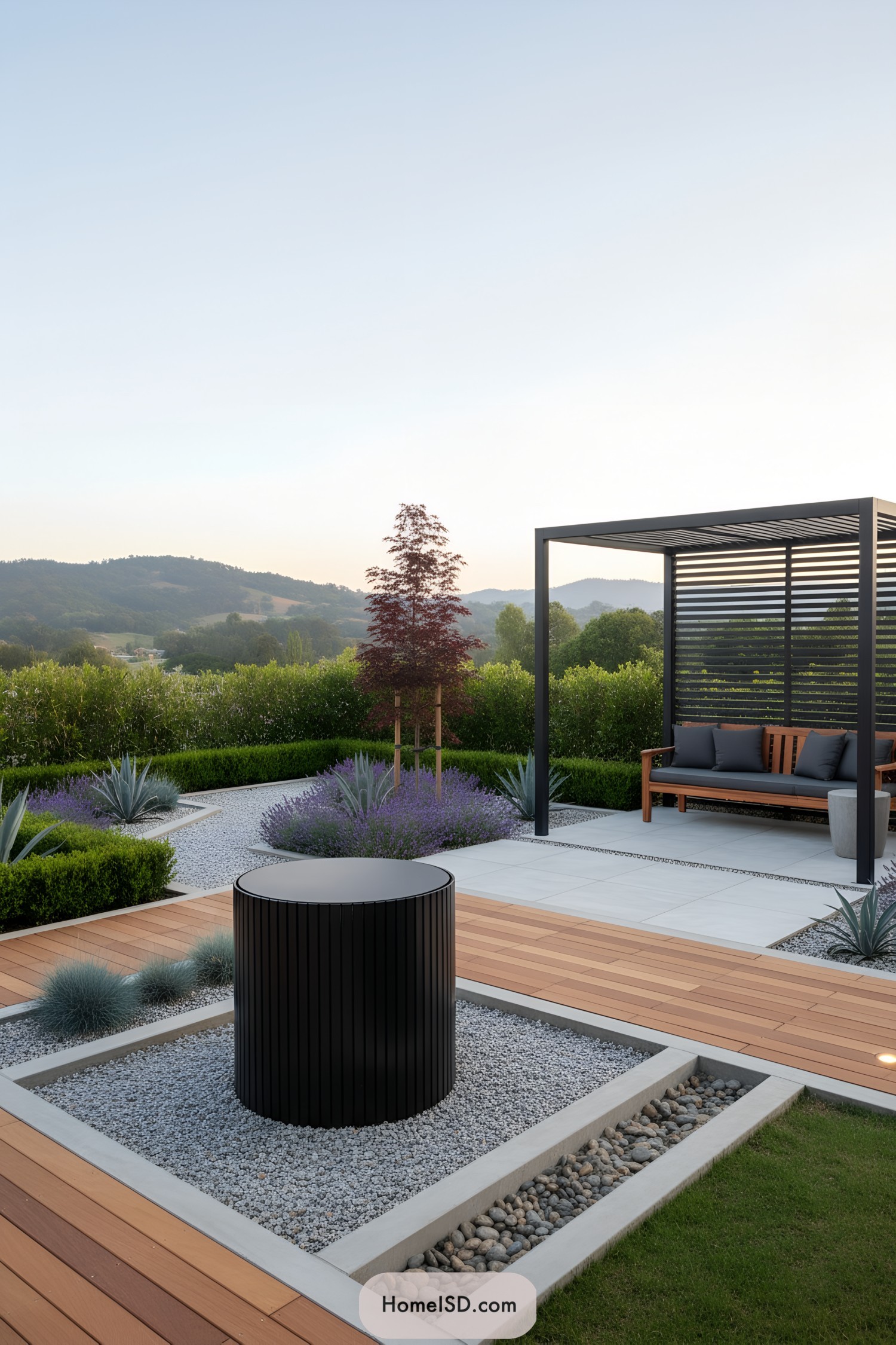 Black round slatted cover on gravel bed
