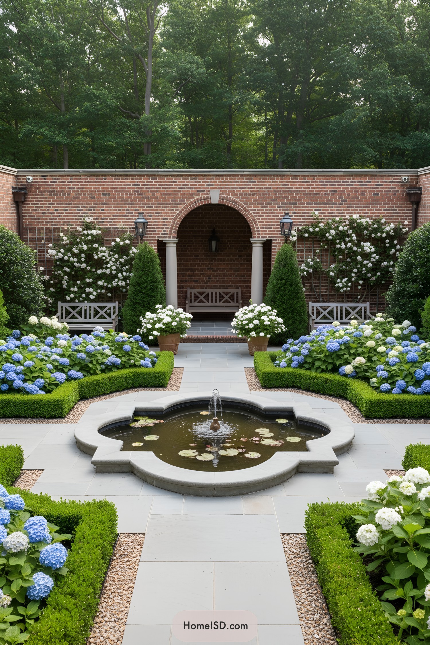 Formal courtyard with quatrefoil fountain and hydrangeas