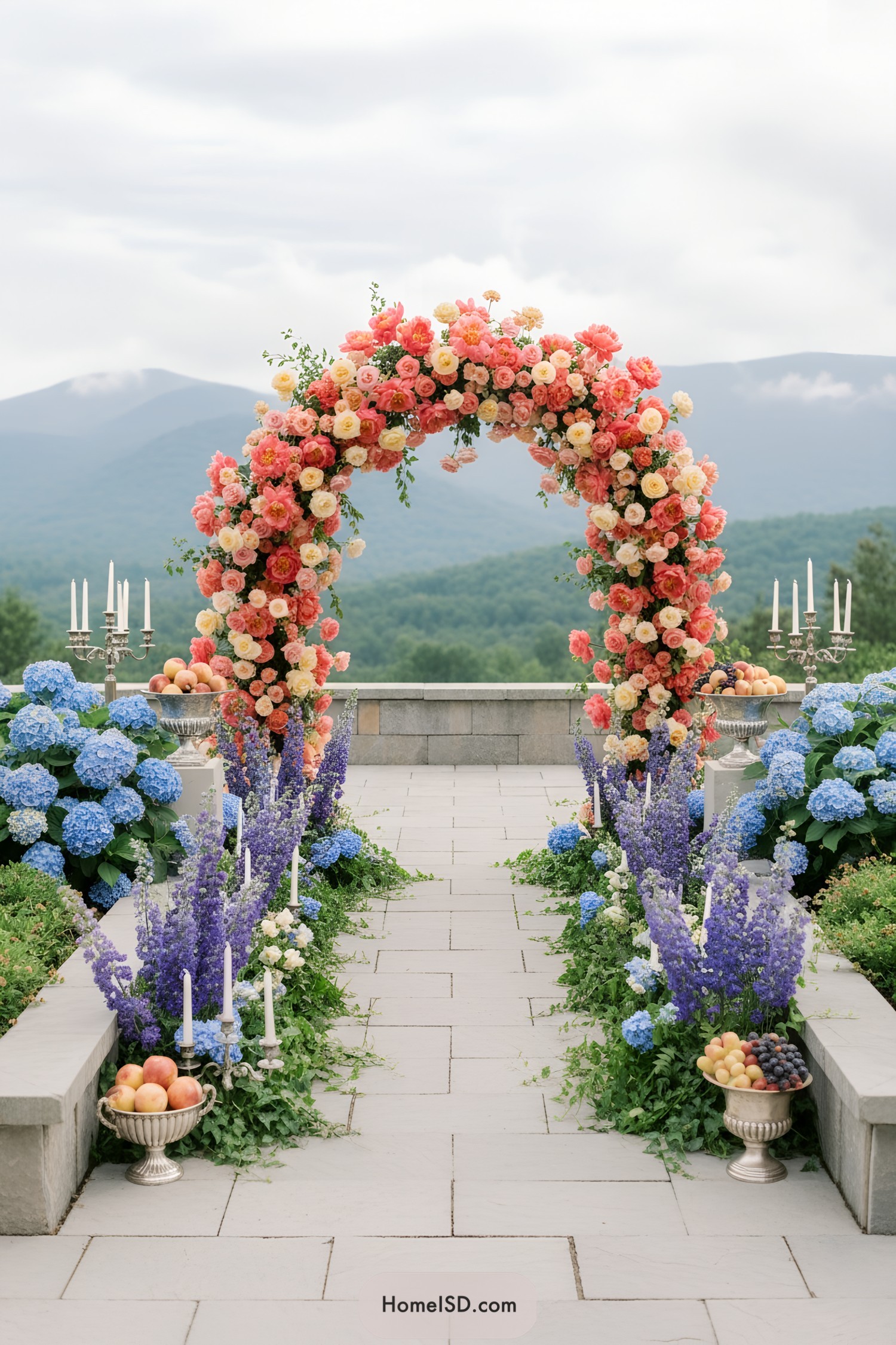 Coral and cream rose arch with blue hydrangeas