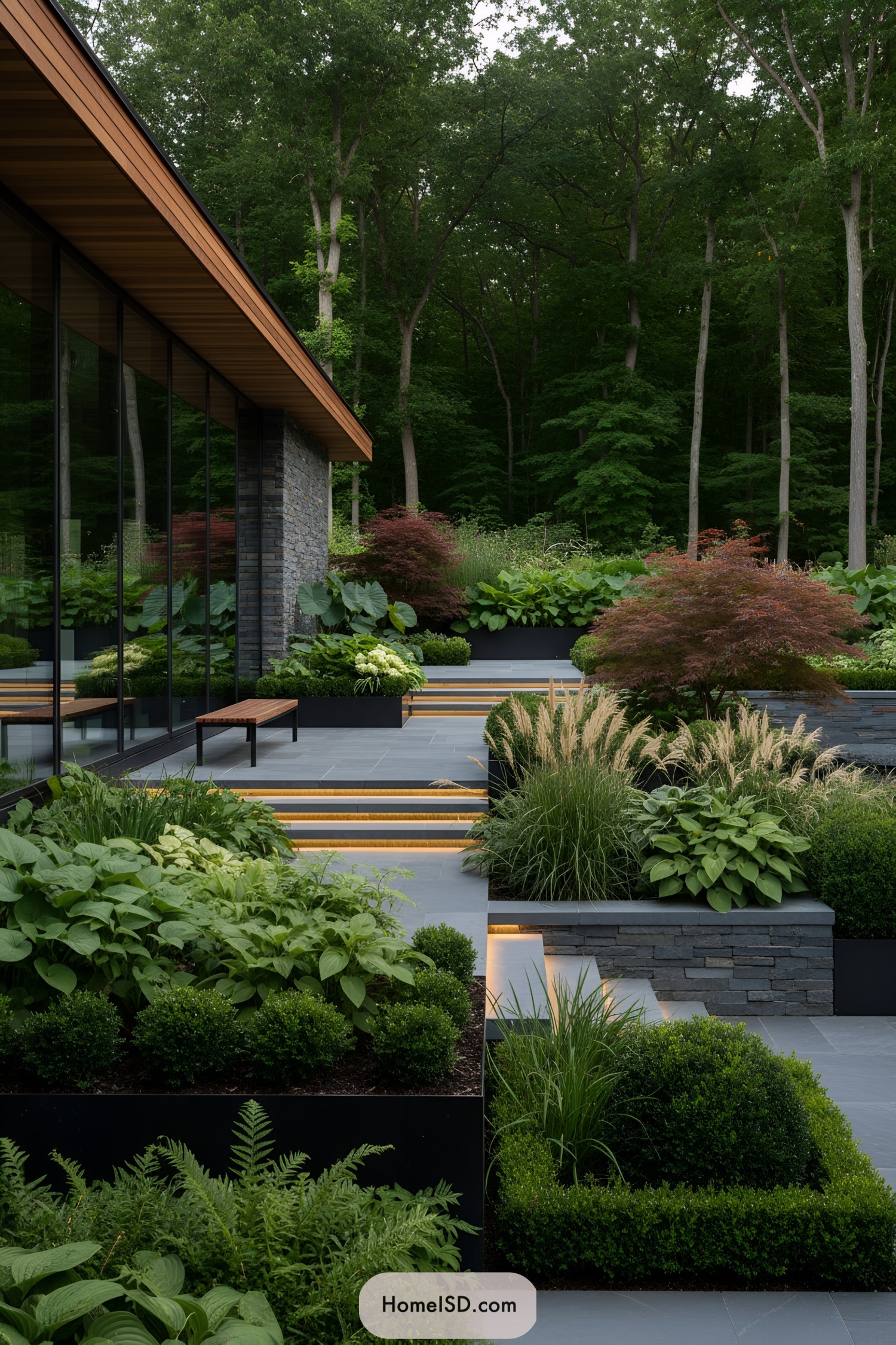 Tiered modern garden with stone steps and lush plantings