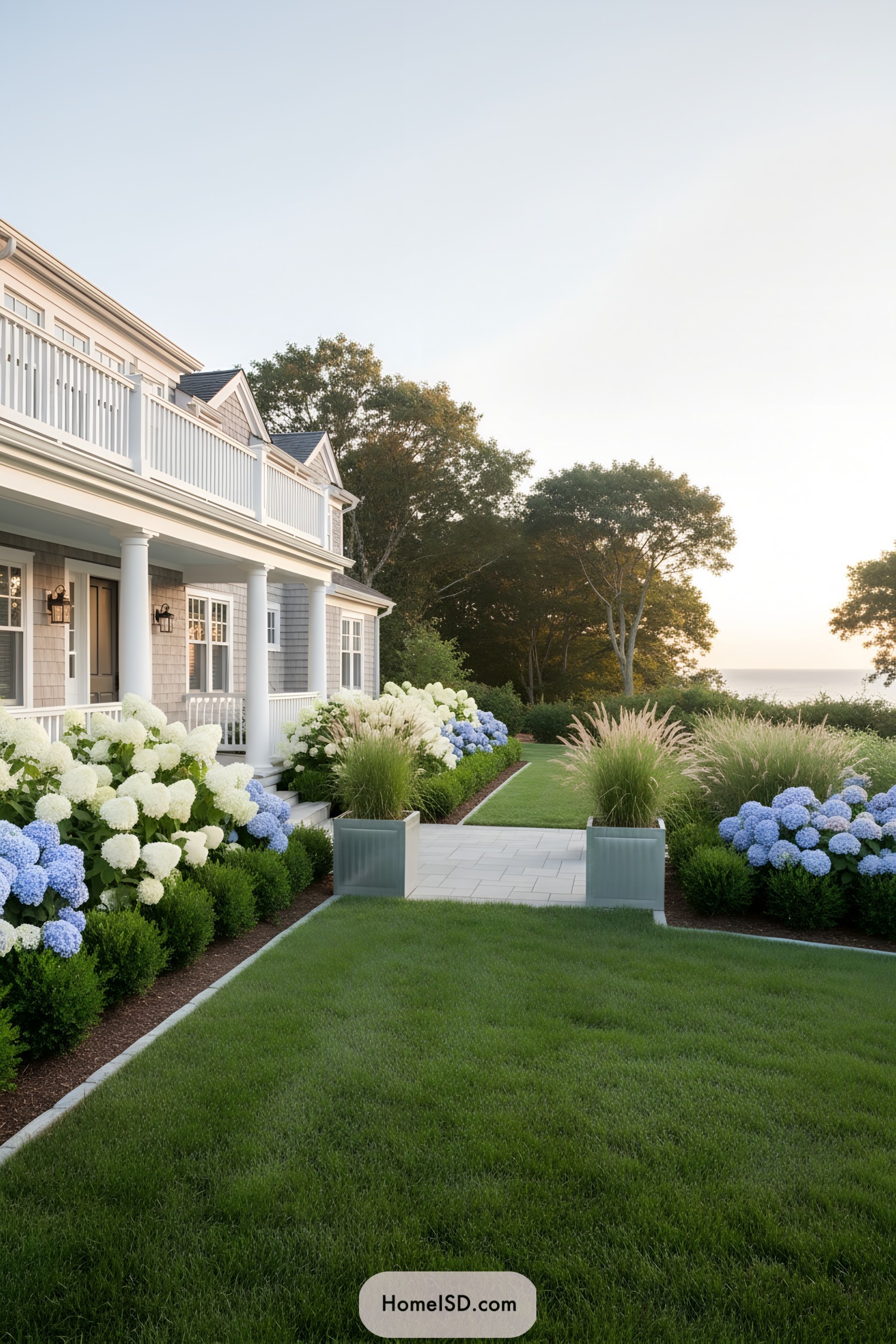 Coastal home front yard with hydrangea-lined lawn