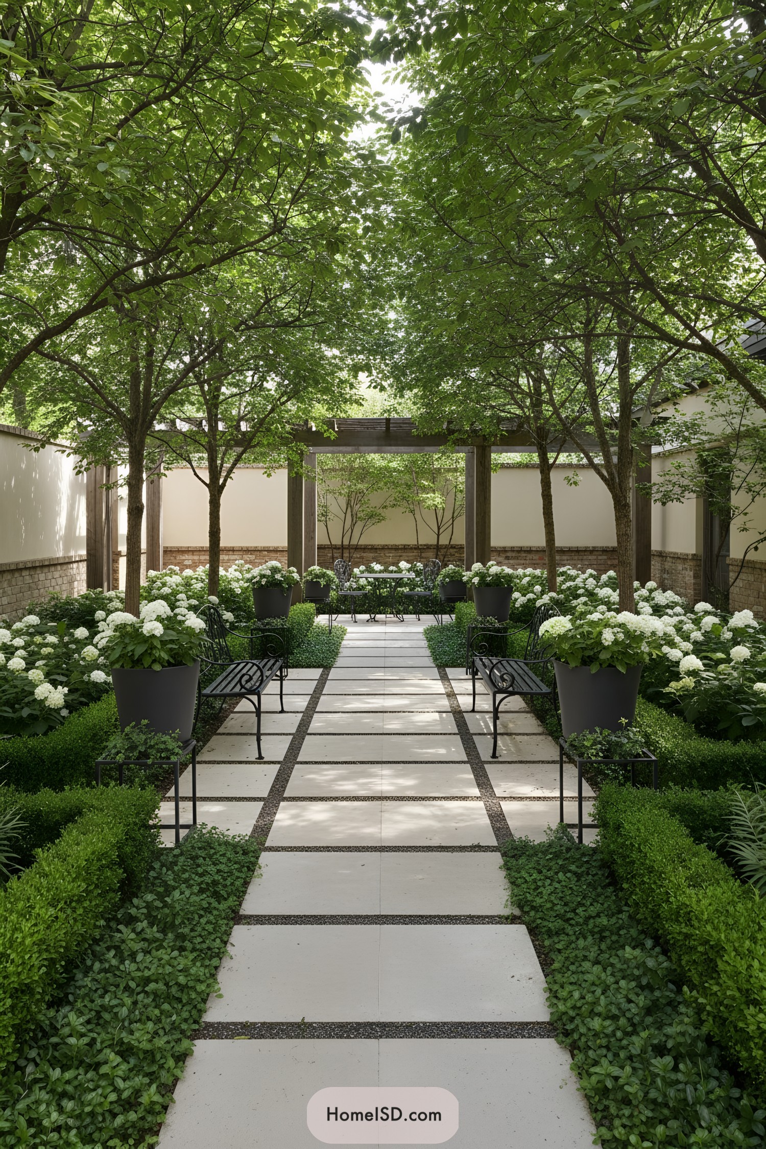 Formal courtyard garden with tree-lined walkway